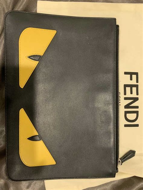 fendi monster clutch ราคา|fendi pants.